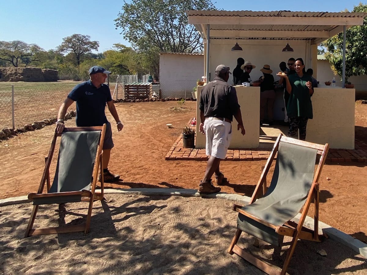 Traditional African braai cooking at Wild Bhiza homestead near Victoria Falls, Zimbabwe, where authentic meals are prepared over open flames for volunteers and guests